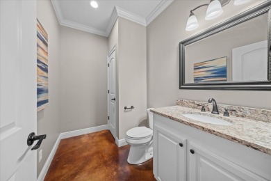 Custom home nestled on a 2.5-acre lot surrounded by a lush on Bay Springs Country Club in Mississippi - for sale on GolfHomes.com, golf home, golf lot