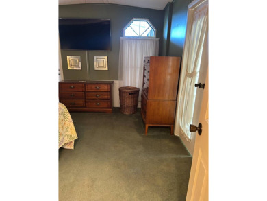 This 2-bedroom, 2-bathroom home offers a perfect place for on Lake Henry Golf Club in Florida - for sale on GolfHomes.com, golf home, golf lot