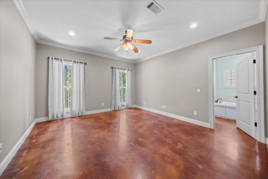Custom home nestled on a 2.5-acre lot surrounded by a lush on Bay Springs Country Club in Mississippi - for sale on GolfHomes.com, golf home, golf lot