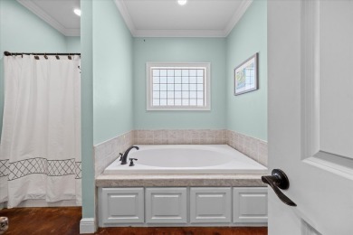 Custom home nestled on a 2.5-acre lot surrounded by a lush on Bay Springs Country Club in Mississippi - for sale on GolfHomes.com, golf home, golf lot