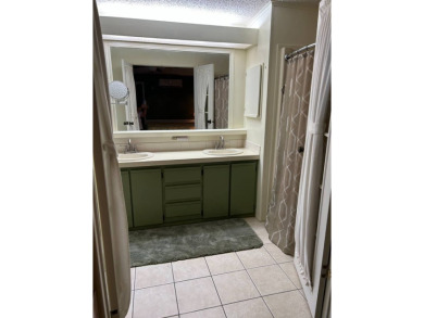 This 2-bedroom, 2-bathroom home offers a perfect place for on Lake Henry Golf Club in Florida - for sale on GolfHomes.com, golf home, golf lot