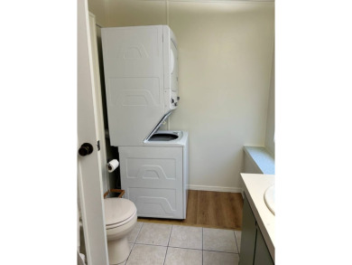 This 2-bedroom, 2-bathroom home offers a perfect place for on Lake Henry Golf Club in Florida - for sale on GolfHomes.com, golf home, golf lot