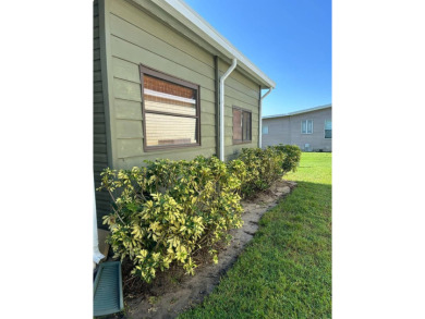 This 2-bedroom, 2-bathroom home offers a perfect place for on Lake Henry Golf Club in Florida - for sale on GolfHomes.com, golf home, golf lot