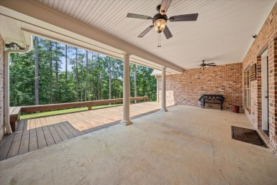 Custom home nestled on a 2.5-acre lot surrounded by a lush on Bay Springs Country Club in Mississippi - for sale on GolfHomes.com, golf home, golf lot