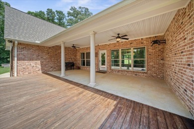 Custom home nestled on a 2.5-acre lot surrounded by a lush on Bay Springs Country Club in Mississippi - for sale on GolfHomes.com, golf home, golf lot