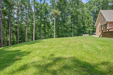 Custom home nestled on a 2.5-acre lot surrounded by a lush on Bay Springs Country Club in Mississippi - for sale on GolfHomes.com, golf home, golf lot