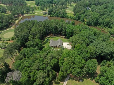 Custom home nestled on a 2.5-acre lot surrounded by a lush on Bay Springs Country Club in Mississippi - for sale on GolfHomes.com, golf home, golf lot