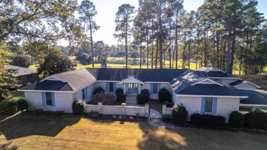 This amazing custom-built Mediterranean style home sits on two on Santee-Cooper Country Club in South Carolina - for sale on GolfHomes.com, golf home, golf lot