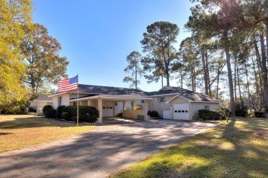 This amazing custom-built Mediterranean style home sits on two on Santee-Cooper Country Club in South Carolina - for sale on GolfHomes.com, golf home, golf lot