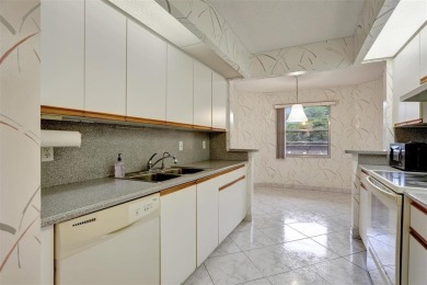 JUST PAINTED & WALLPAPER REMOVED! SALE OF THE CENTURY IN VIBRANT on Wynmoor Golf Course in Florida - for sale on GolfHomes.com, golf home, golf lot
