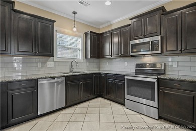 GATES FOUR - Guarded/Gated/Golf Community. Two Story Stone & on Gates Four Golf and Country Club in North Carolina - for sale on GolfHomes.com, golf home, golf lot