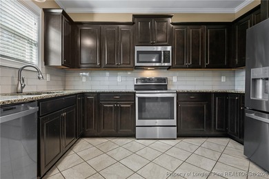 GATES FOUR - Guarded/Gated/Golf Community. Two Story Stone & on Gates Four Golf and Country Club in North Carolina - for sale on GolfHomes.com, golf home, golf lot