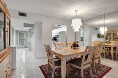 JUST PAINTED & WALLPAPER REMOVED! SALE OF THE CENTURY IN VIBRANT on Wynmoor Golf Course in Florida - for sale on GolfHomes.com, golf home, golf lot