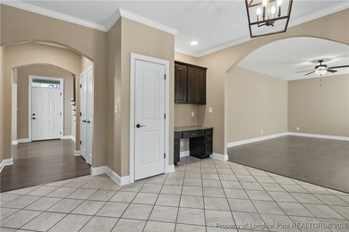 GATES FOUR - Guarded/Gated/Golf Community. Two Story Stone & on Gates Four Golf and Country Club in North Carolina - for sale on GolfHomes.com, golf home, golf lot