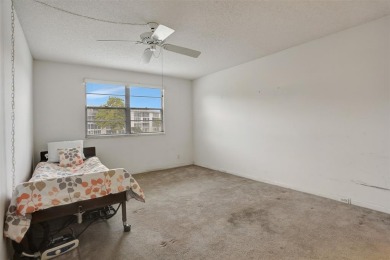 JUST PAINTED & WALLPAPER REMOVED! SALE OF THE CENTURY IN VIBRANT on Wynmoor Golf Course in Florida - for sale on GolfHomes.com, golf home, golf lot