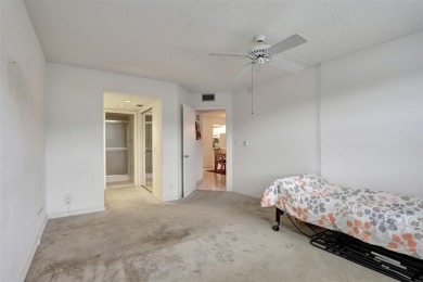 JUST PAINTED & WALLPAPER REMOVED! SALE OF THE CENTURY IN VIBRANT on Wynmoor Golf Course in Florida - for sale on GolfHomes.com, golf home, golf lot