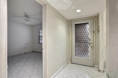 JUST PAINTED & WALLPAPER REMOVED! SALE OF THE CENTURY IN VIBRANT on Wynmoor Golf Course in Florida - for sale on GolfHomes.com, golf home, golf lot