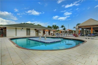 JUST PAINTED & WALLPAPER REMOVED! SALE OF THE CENTURY IN VIBRANT on Wynmoor Golf Course in Florida - for sale on GolfHomes.com, golf home, golf lot