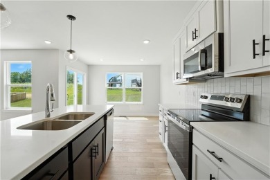 Step into the *Gardenia*, where modern charm and functionality on Golf Club of Creekmoor in Missouri - for sale on GolfHomes.com, golf home, golf lot