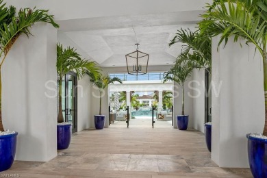 Experience the pinnacle of coastal elegance in this Grande on Colliers Reserve Country Club in Florida - for sale on GolfHomes.com, golf home, golf lot