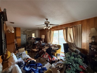 Seize the opportunity rehab this lovely three-bedroom home on Ebony Hills Public Golf Course in Texas - for sale on GolfHomes.com, golf home, golf lot