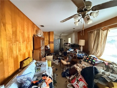 Seize the opportunity rehab this lovely three-bedroom home on Ebony Hills Public Golf Course in Texas - for sale on GolfHomes.com, golf home, golf lot