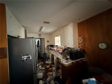 Seize the opportunity rehab this lovely three-bedroom home on Ebony Hills Public Golf Course in Texas - for sale on GolfHomes.com, golf home, golf lot