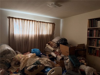 Seize the opportunity rehab this lovely three-bedroom home on Ebony Hills Public Golf Course in Texas - for sale on GolfHomes.com, golf home, golf lot