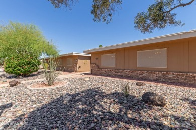 This well-cared-for 2-bedroom, 1.75-bath townhome is move-in on Sun City Lakes West and East in Arizona - for sale on GolfHomes.com, golf home, golf lot