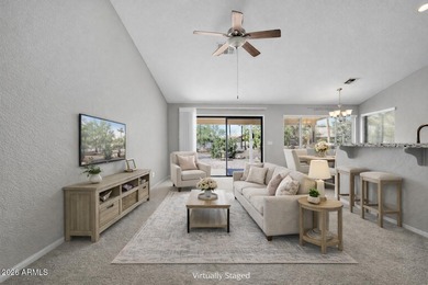 Don't judge this home by the front door. Inside, it's calm on Sun Lakes Country Club in Arizona - for sale on GolfHomes.com, golf home, golf lot