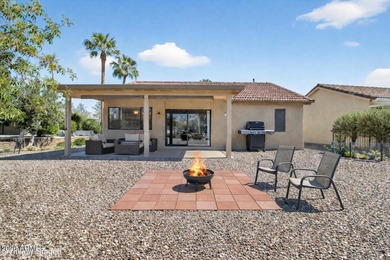 Don't judge this home by the front door. Inside, it's calm on Sun Lakes Country Club in Arizona - for sale on GolfHomes.com, golf home, golf lot