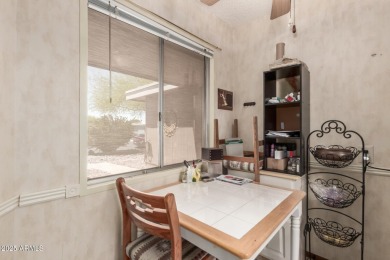 This well-cared-for 2-bedroom, 1.75-bath townhome is move-in on Sun City Lakes West and East in Arizona - for sale on GolfHomes.com, golf home, golf lot