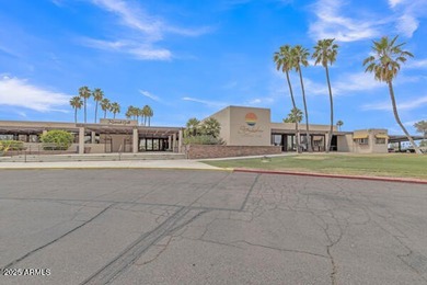 Don't judge this home by the front door. Inside, it's calm on Sun Lakes Country Club in Arizona - for sale on GolfHomes.com, golf home, golf lot