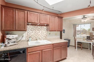 This well-cared-for 2-bedroom, 1.75-bath townhome is move-in on Sun City Lakes West and East in Arizona - for sale on GolfHomes.com, golf home, golf lot