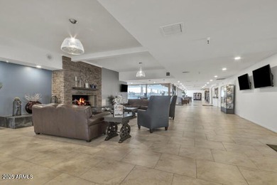 Don't judge this home by the front door. Inside, it's calm on Sun Lakes Country Club in Arizona - for sale on GolfHomes.com, golf home, golf lot