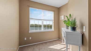 Your Lakeside Escape in the Heart of Viera This 2 bed, 2 bath on Indian River Colony Club in Florida - for sale on GolfHomes.com, golf home, golf lot