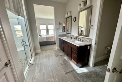 This home comes with approximately $300,000 in upgrades on Mission Hills Golf Club in California - for sale on GolfHomes.com, golf home, golf lot