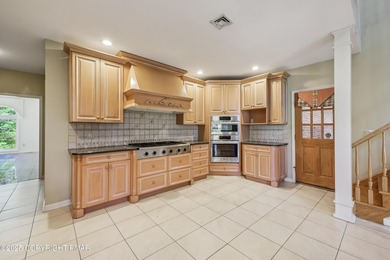 Experience refined luxury and serene privacy in this exceptional on Great Bear Golf and Country Club in Pennsylvania - for sale on GolfHomes.com, golf home, golf lot