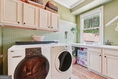 Discover your serene sanctuary at 38 Cavender Run, nestled on Achasta Golf Club in Georgia - for sale on GolfHomes.com, golf home, golf lot