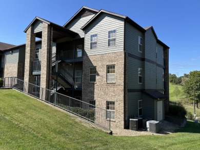 Walk-In Golf front condo with a pond view located  at on Ledgestone Country Club and Golf Course in Missouri - for sale on GolfHomes.com, golf home, golf lot