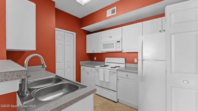 Your Lakeside Escape in the Heart of Viera This 2 bed, 2 bath on Indian River Colony Club in Florida - for sale on GolfHomes.com, golf home, golf lot