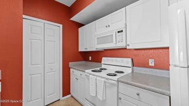 Your Lakeside Escape in the Heart of Viera This 2 bed, 2 bath on Indian River Colony Club in Florida - for sale on GolfHomes.com, golf home, golf lot