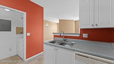 Your Lakeside Escape in the Heart of Viera This 2 bed, 2 bath on Indian River Colony Club in Florida - for sale on GolfHomes.com, golf home, golf lot