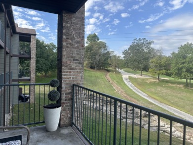 Walk-In Golf front condo with a pond view located  at on Ledgestone Country Club and Golf Course in Missouri - for sale on GolfHomes.com, golf home, golf lot