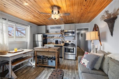 GET THAT COZY CABIN FEEL AT A FRACTION OF THE COST! Year-round on Beech Mountain Club in North Carolina - for sale on GolfHomes.com, golf home, golf lot