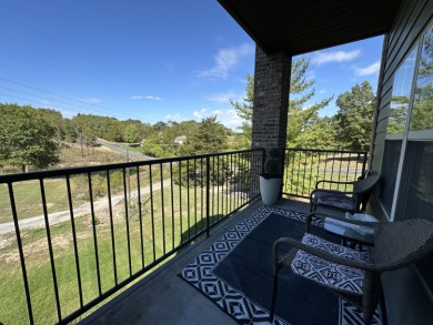 Walk-In Golf front condo with a pond view located  at on Ledgestone Country Club and Golf Course in Missouri - for sale on GolfHomes.com, golf home, golf lot
