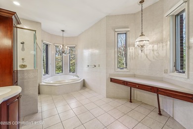 Experience refined luxury and serene privacy in this exceptional on Great Bear Golf and Country Club in Pennsylvania - for sale on GolfHomes.com, golf home, golf lot