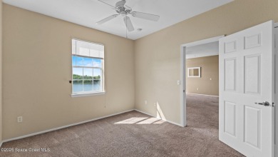 Your Lakeside Escape in the Heart of Viera This 2 bed, 2 bath on Indian River Colony Club in Florida - for sale on GolfHomes.com, golf home, golf lot