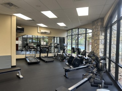 Walk-In Golf front condo with a pond view located  at on Ledgestone Country Club and Golf Course in Missouri - for sale on GolfHomes.com, golf home, golf lot