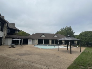 Walk-In Golf front condo with a pond view located  at on Ledgestone Country Club and Golf Course in Missouri - for sale on GolfHomes.com, golf home, golf lot